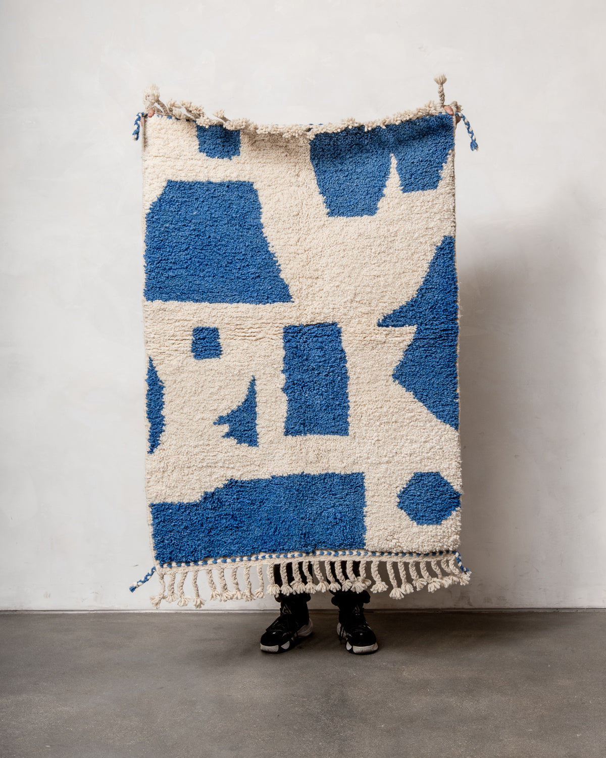 Modern, designer, handcrafted Berber rug from Morocco. Beniourain carpet with beautiful colours and patterns and fluffy wool texture.